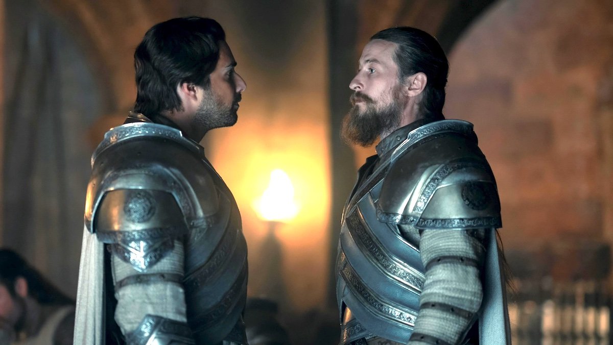 Kingsguard members Criston Cole and Arryk Cargyll in profile stare at one another on House of the Dragon