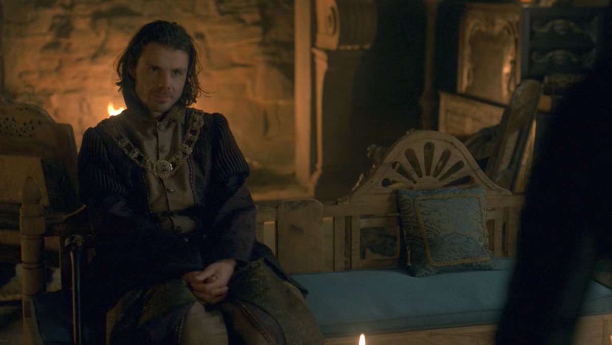 Larys Strong sits while speaking with Alicent Hightower on House of the Dragon