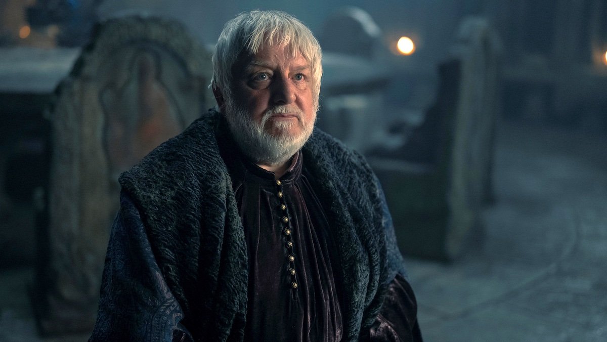 The white-haired, white-bearded Ser Simon Strong in his black robes on House of the Dragon