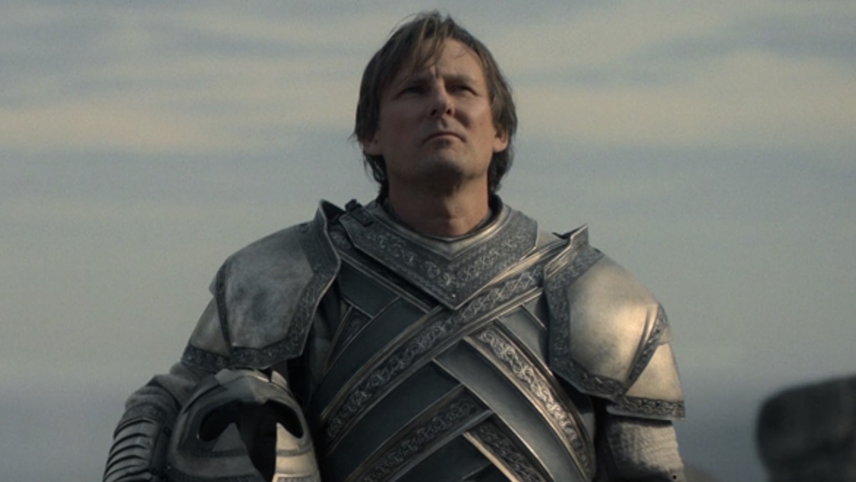 Ser Steffon Darklyn of Rhaenyra's Queensguard in his armor listening to Daemon speak Ser-Steffon-Darklyn