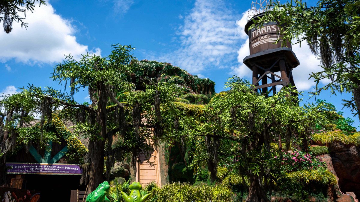 The lush exterior of Tiana's Bayou Adventures